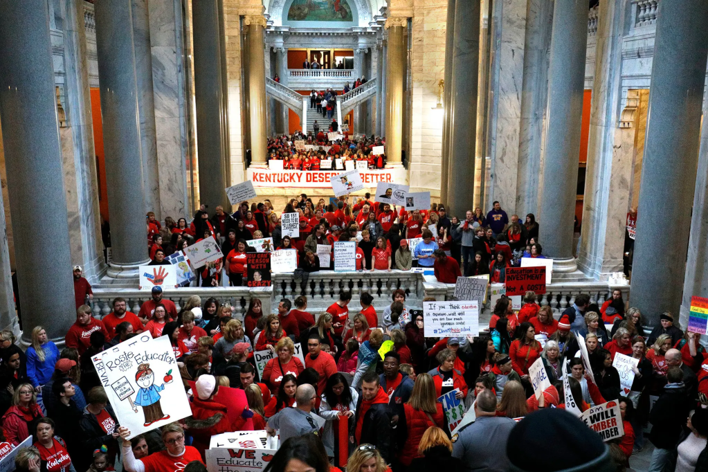 Hundreds of educators in "Red for Ed" T-shirts are in the Kentucky capitol building.