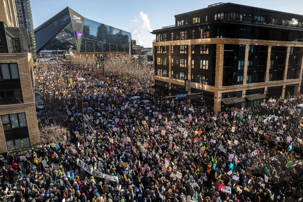 Tens of thousands of people line the streets of downtown Minneapolis to march on the day of No Work, No School, No Shopping against ICE.